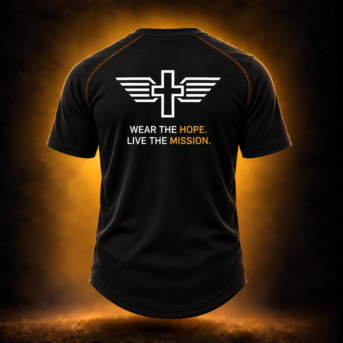 Back of the black Renew Performance Tee concept with the white WLE crest and Wear the Hope Live the Mission slogan in white and Hope Gold.